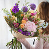 Feelings of Love with seasonal flowers in all shades!