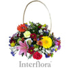 Composition in a Basket with Seasonal Flowers